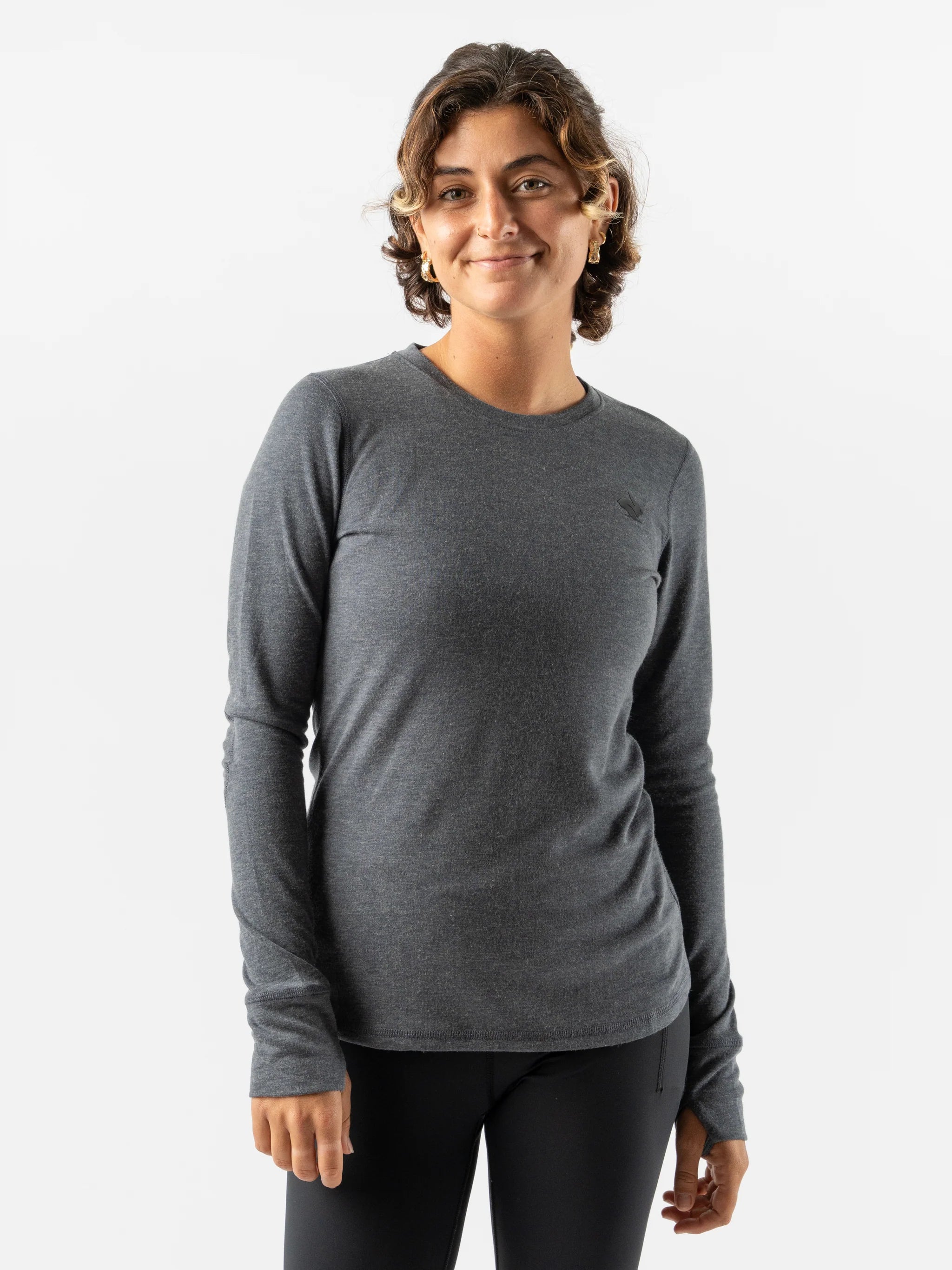 Outrun - Women by Rabbit in dark grey midweight knit shirt with wool blend, odor resistant and temperature regulating for cold weather running