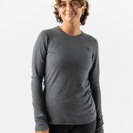 Outrun - Women by Rabbit in dark grey midweight knit shirt with wool blend, odor resistant and temperature regulating for cold weather running
