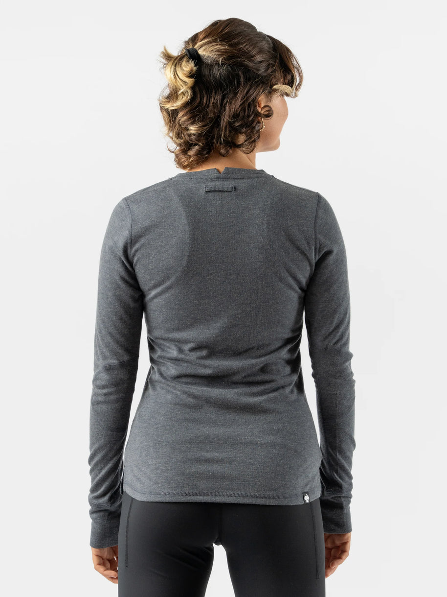 Outrun - Women by Rabbit in dark grey midweight wool blend top that regulates temperature and resists odor, ideal for cold weather running