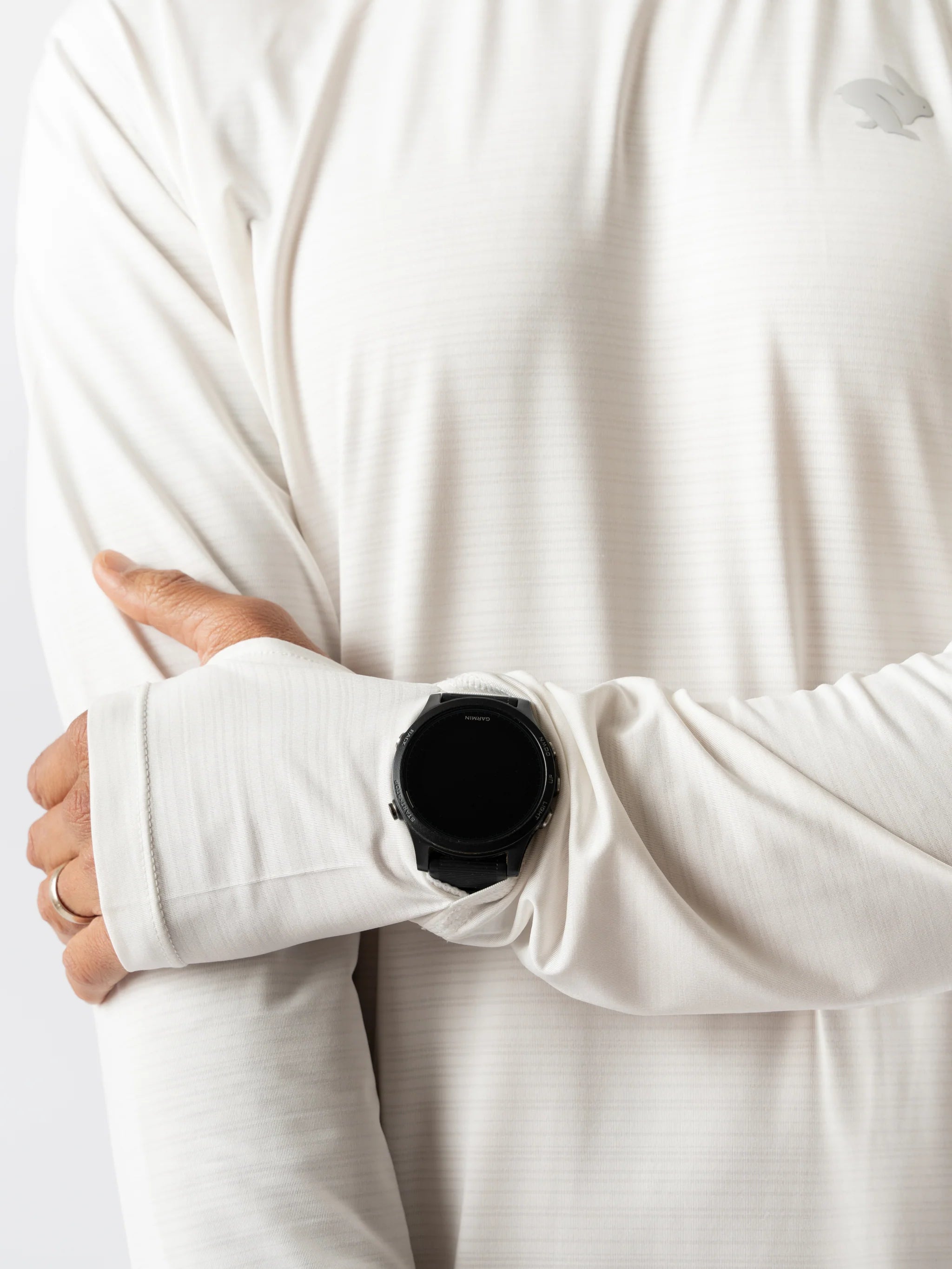 UPF Tee LS - Men by Rabbit in white, lightweight breathable long sleeve with UPF 50 and cooling laser-cut perfs for sunny runs