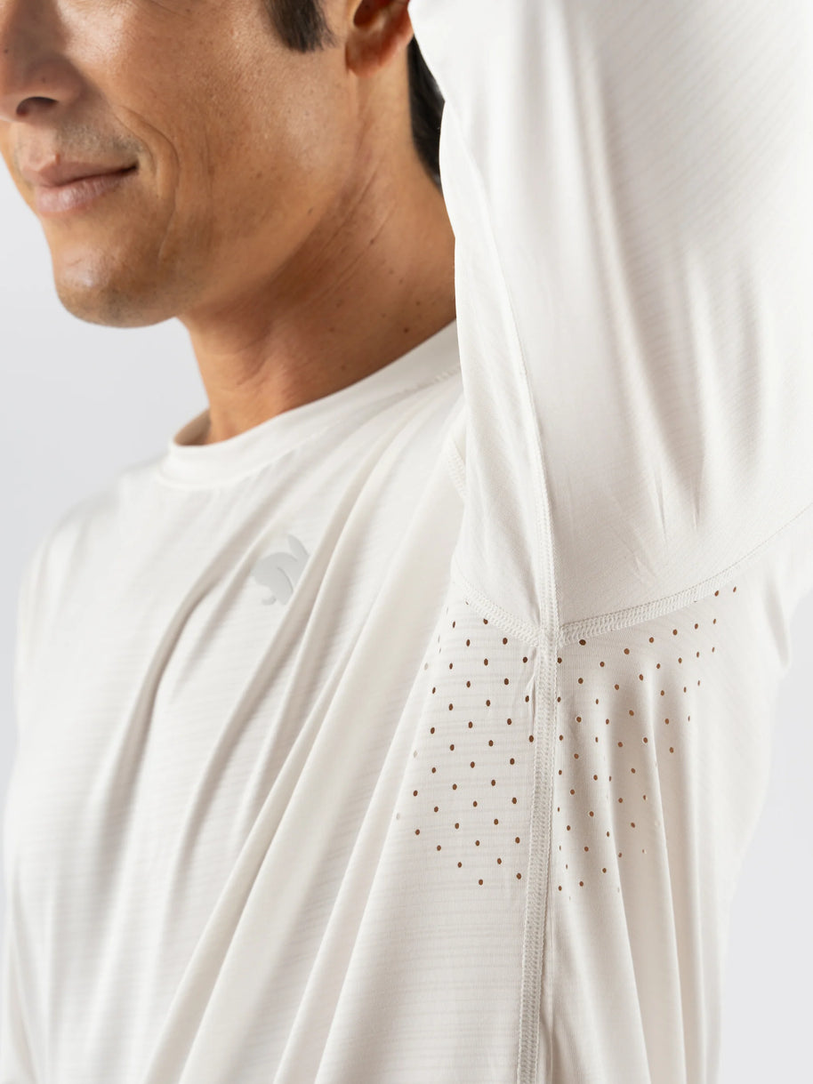 UPF Tee LS - Men by Rabbit in white, lightweight breathable long sleeve with UPF 50 and laser-cut perfs for cooling during sunny runs