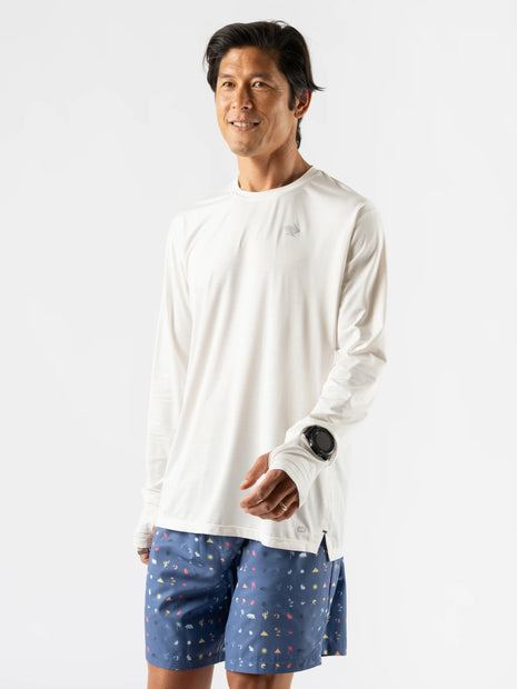 UPF Tee LS - Men by Rabbit in white, lightweight breathable long sleeve shirt with UPF 50 and laser-cut perfs, ideal for sunny runs