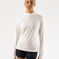 UPF Deflector 2.0 - Women by Rabbit in light beige, lightweight sun-protective top with UPF 50 and laser-cut ventilation, ideal for sensitive skin and outdoor running