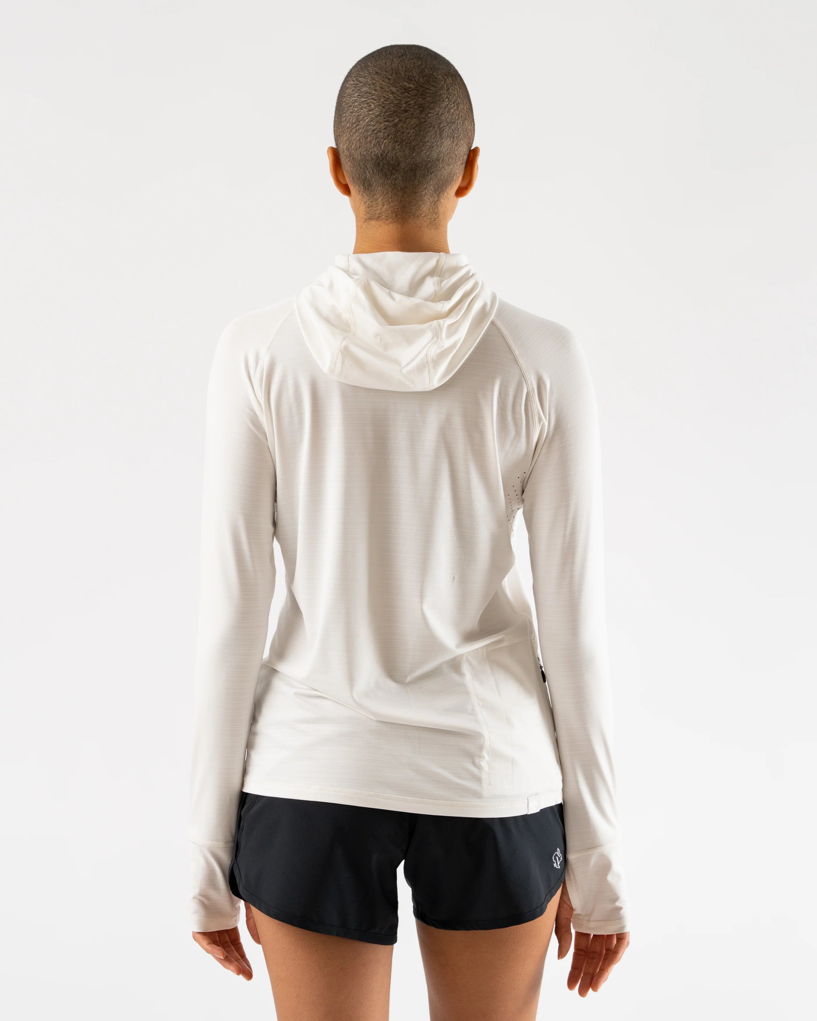 UPF Deflector 2.0 - Women by Rabbit in light beige, lightweight jersey top with UPF 50 and laser cut ventilation, ideal for sun protection and running