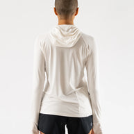 UPF Deflector 2.0 - Women by Rabbit in light beige, lightweight jersey top with UPF 50 and laser cut ventilation, ideal for sun protection and running