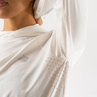 UPF Deflector 2.0 - Women by Rabbit in light cream lightweight jersey top with laser cut vents and UPF 50 for sun protection and sensitive skin