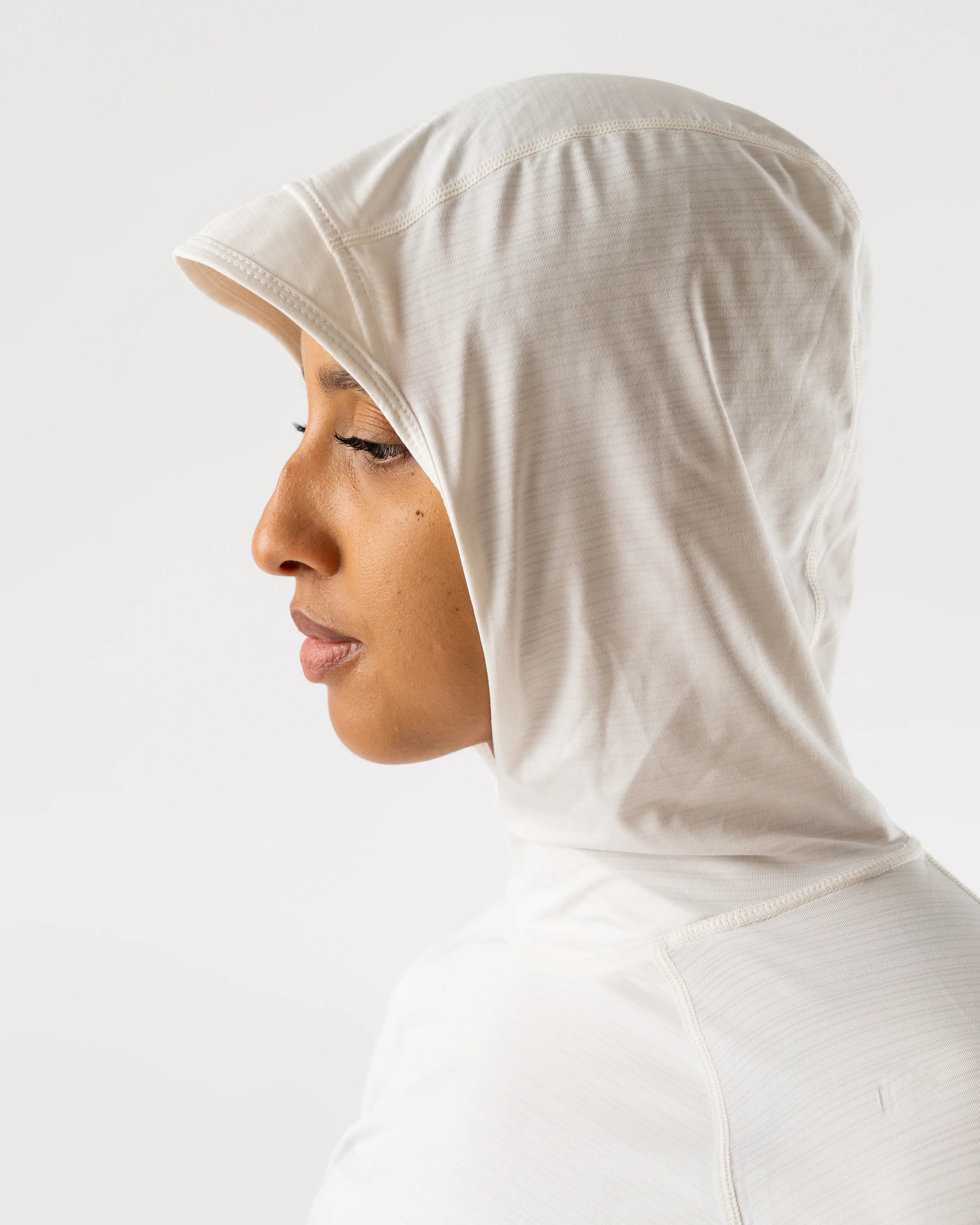 UPF Deflector 2.0 - Women by Rabbit in light beige, lightweight jersey top with UPF 50 sun protection and breathable ventilation for sensitive skin