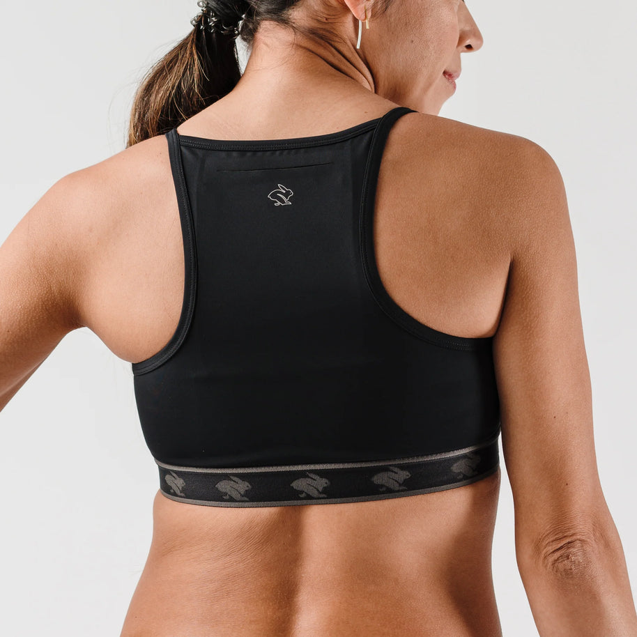 Strappy Pocket Bra - Women by Rabbit in black with built-in pocket, minimal bounce, comfortable fit for running and activewear