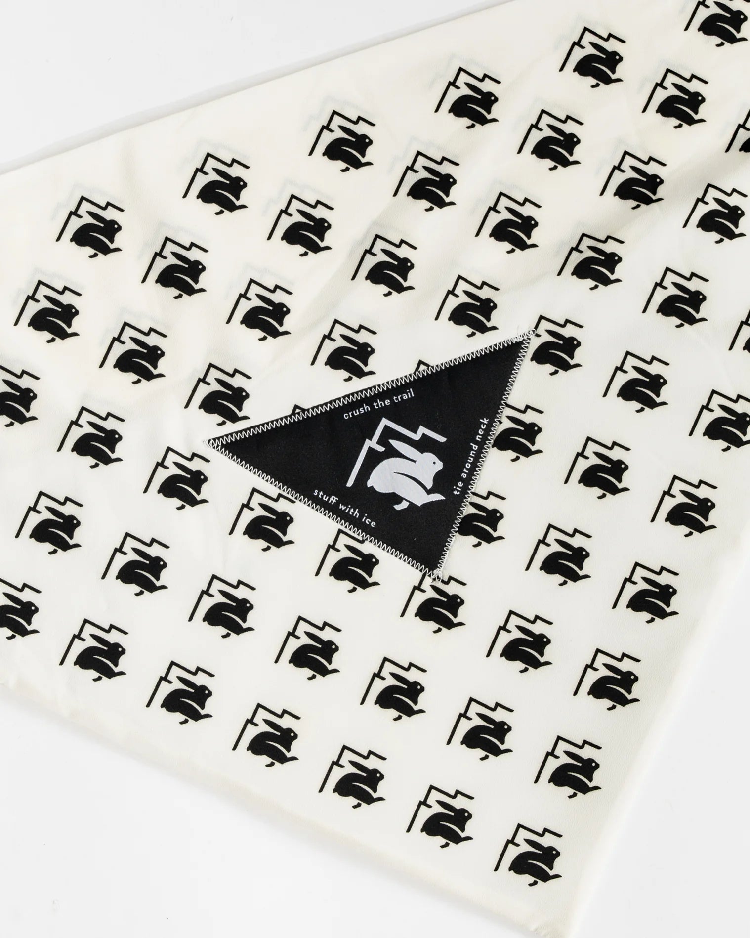 Ice RAD-Dana by Rabbit in black and white triangle bandana with ice pocket, made from recycled polyester and spandex for cooling runs