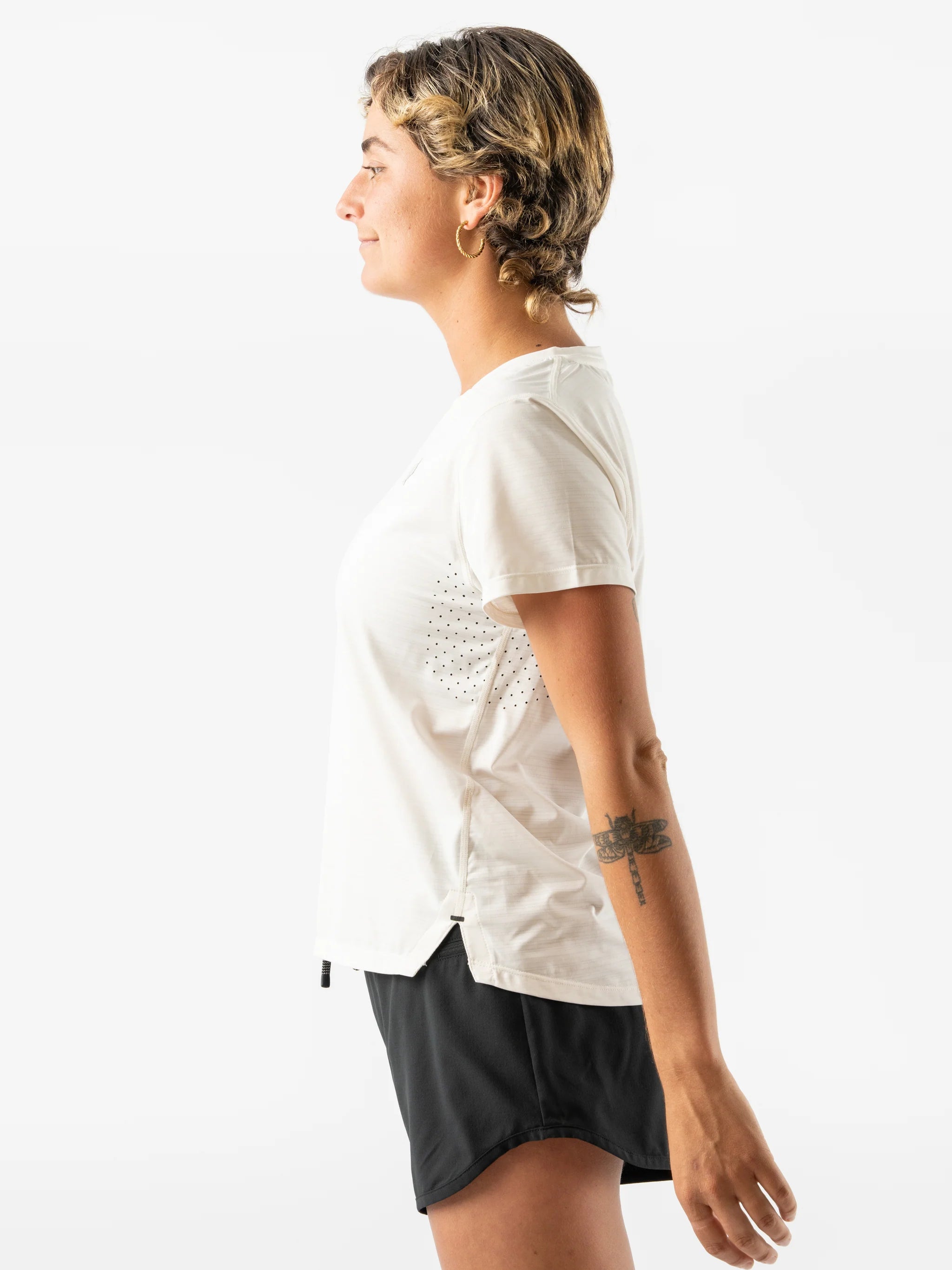 UPF Tee SS - Women by Rabbit in off-white, lightweight jersey with laser-cut underarm perfs, UPF 50 protection, ideal for sun-safe running and outdoor use