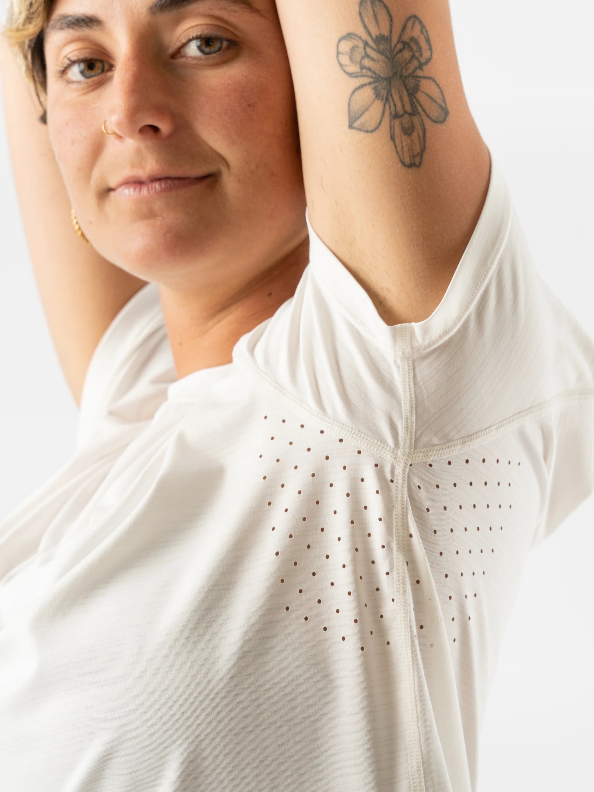 UPF Tee SS - Women by Rabbit in white with laser-cut perfs under arms, ultra lightweight jersey, UPF 50 protection for sun safety