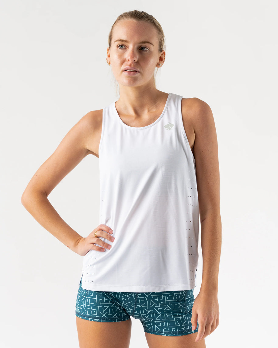 Race Pace Tank - Women by Rabbit in white with breathable laser-cut perfs and microtextured inside, ideal for running and training.