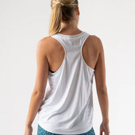 Race Pace Tank - Women by Rabbit in white with laser-cut perfs and microtextured inside for breathable comfort during running training and races