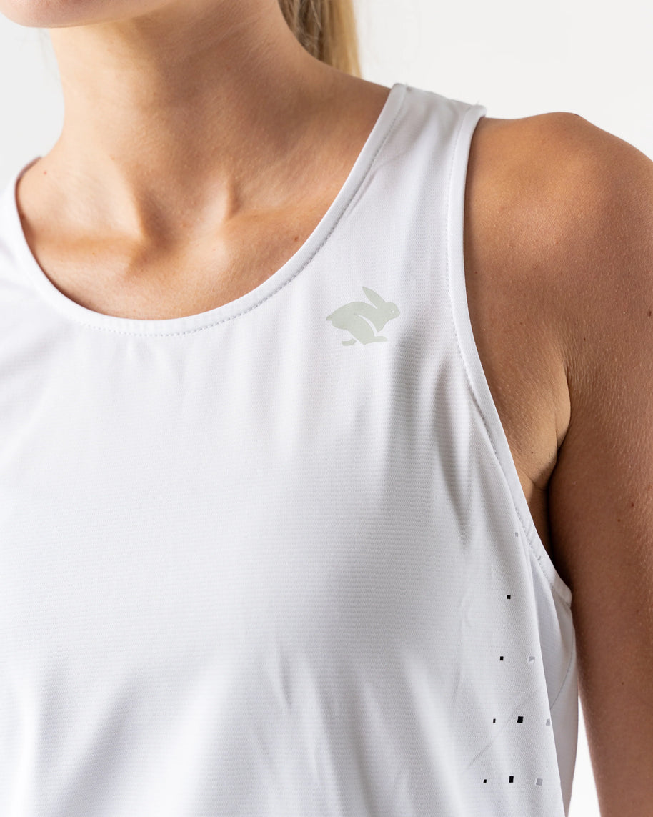 Race Pace Tank - Women by Rabbit in white with laser-cut square perfs and breathable design for running and training comfort