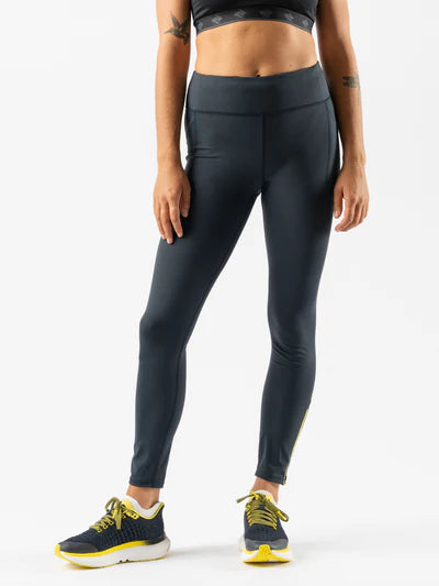 Low Light Speed Tights - Women by Rabbit in dark grey with 360° reflective print, compressive fit, laser-cut perfs, and five pockets for running safety and comfort