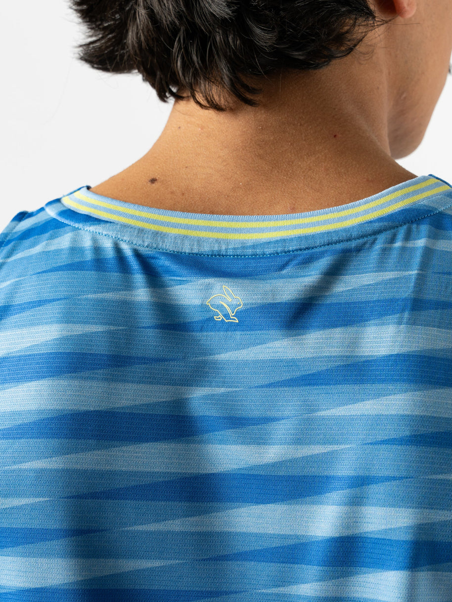 Race Pace Tank - Men by Rabbit in blue with laser-cut perforations, breathable semi-relaxed running tank for training and racing