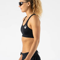 Hydration Trail Bra in black by Rabbit with built-in HydraPak pocket and included 250mL soft flask for trail running hydration