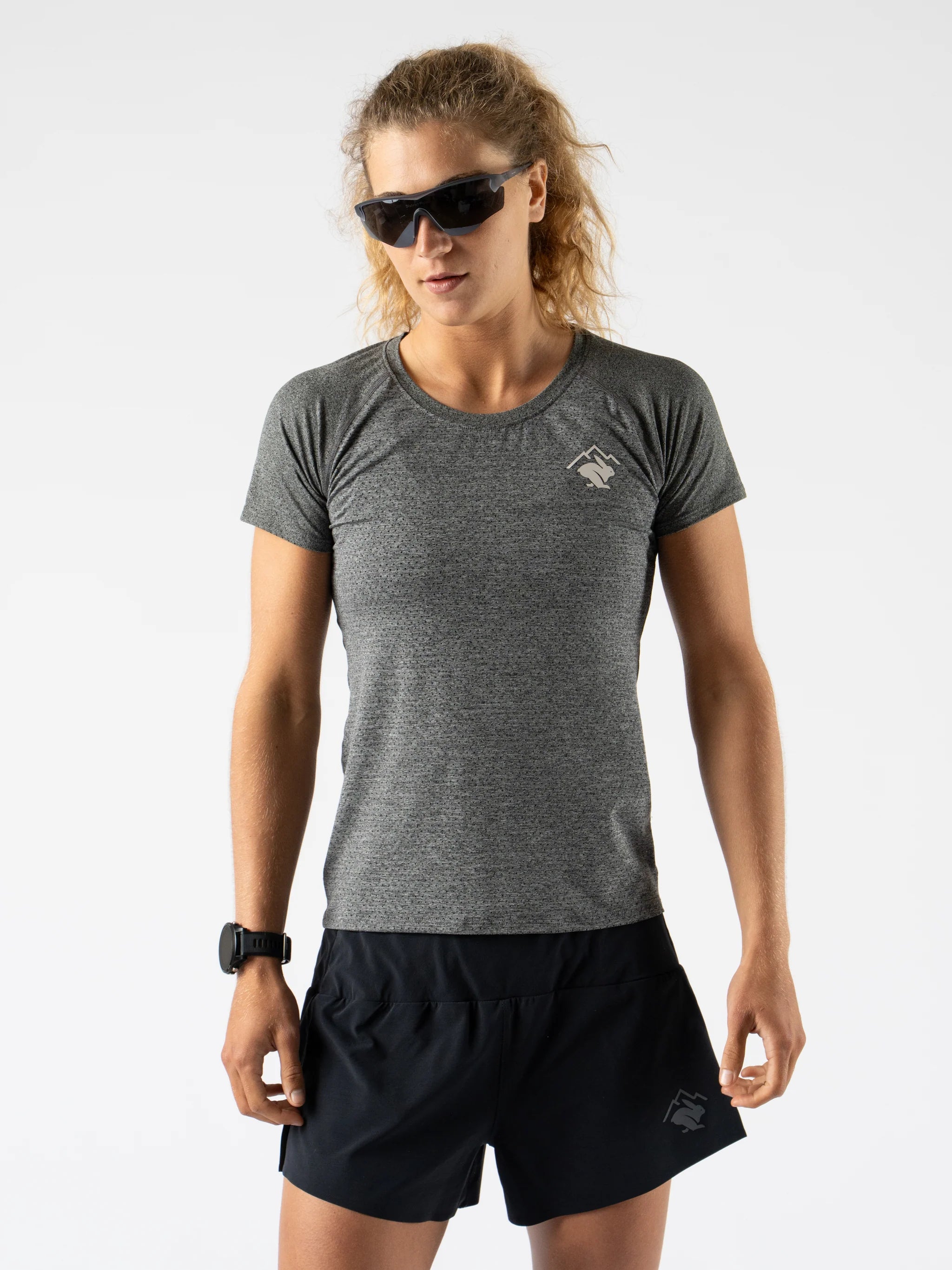 EZ Tee Perf SS Trail - Women by Rabbit in dark grey lightweight breathable running top with perforations for trail running comfort