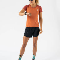 EZ Tee Perf SS Trail - Women by Rabbit in rust and dark red, lightweight breathable trail running shirt with perfs for enhanced ventilation ideal for outdoor running.