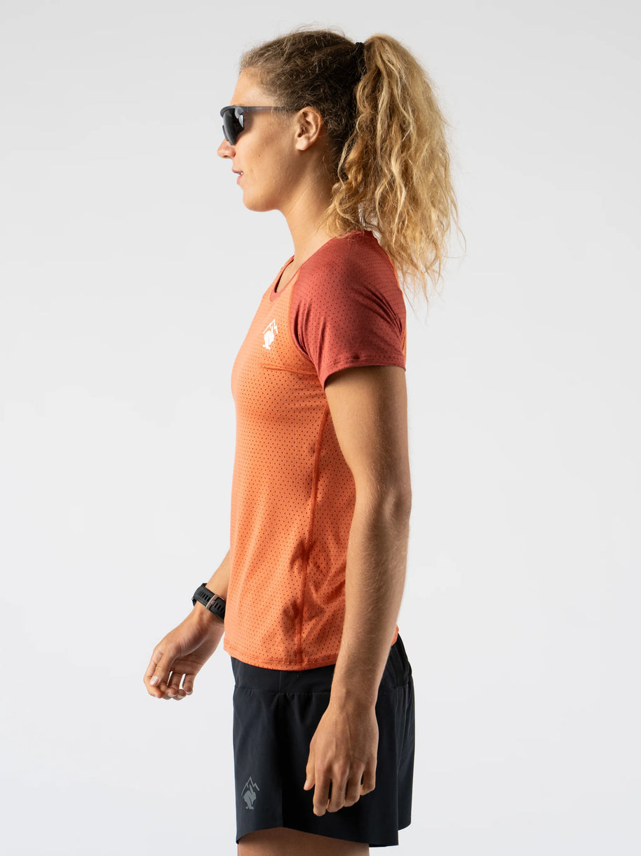 EZ Tee Perf SS Trail - Women by Rabbit in rust orange lightweight breathable perforated running shirt ideal for trail running outdoors