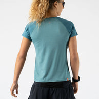 EZ Tee Perf SS Trail - Women by Rabbit in teal, breathable lightweight perforated running top designed for trail running comfort and breathability