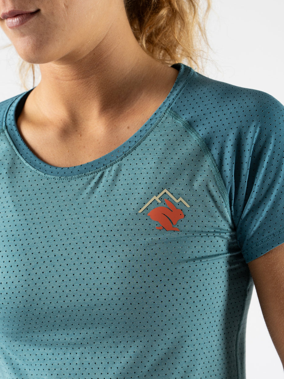 EZ Tee Perf SS Trail - Women by Rabbit in light teal with perforations, soft breathable running top ideal for trail running and outdoor use