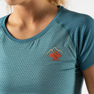EZ Tee Perf SS Trail - Women by Rabbit in light teal with perforations, soft breathable running top ideal for trail running and outdoor use