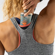 Hydration Trail Tank - Women in grey and coral by Rabbit, lightweight racerback with breathable EZ Perf Trail fabric for long runs