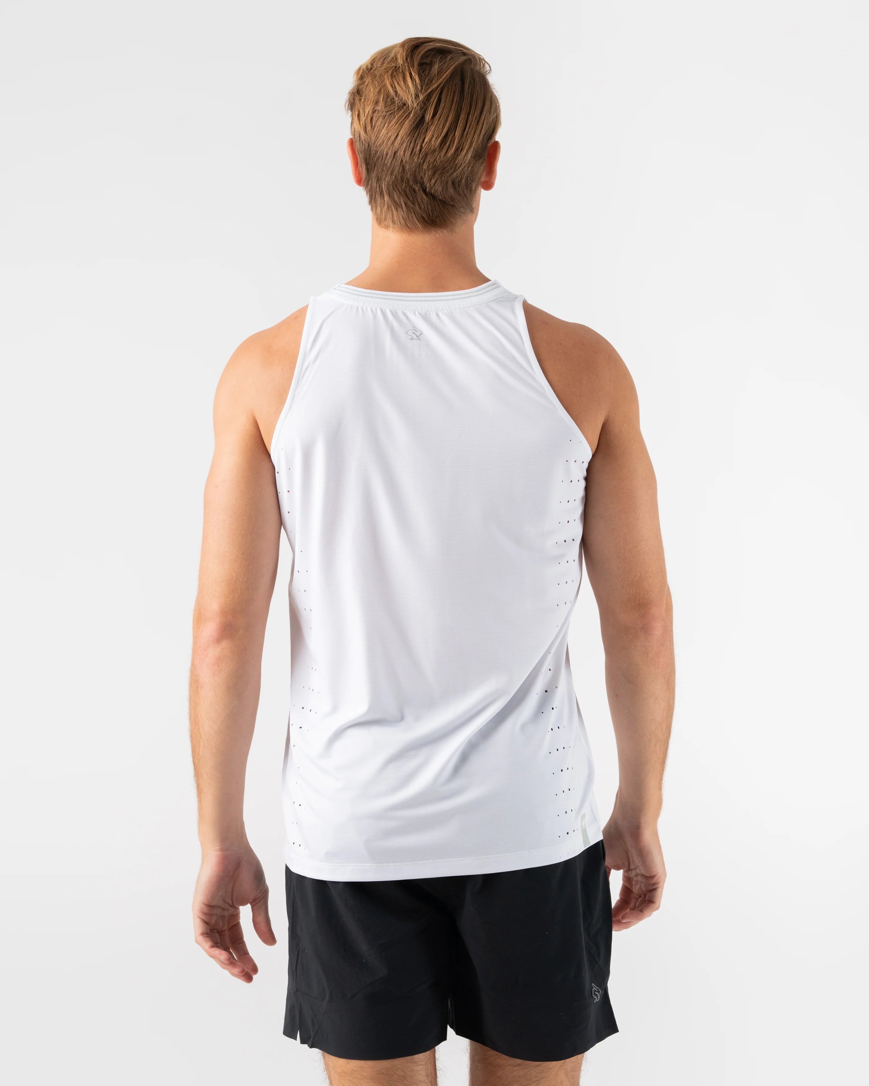 Race Pace Tank - Men by Rabbit in white with laser-cut square perfs for breathability, semi-relaxed fit for running and training use