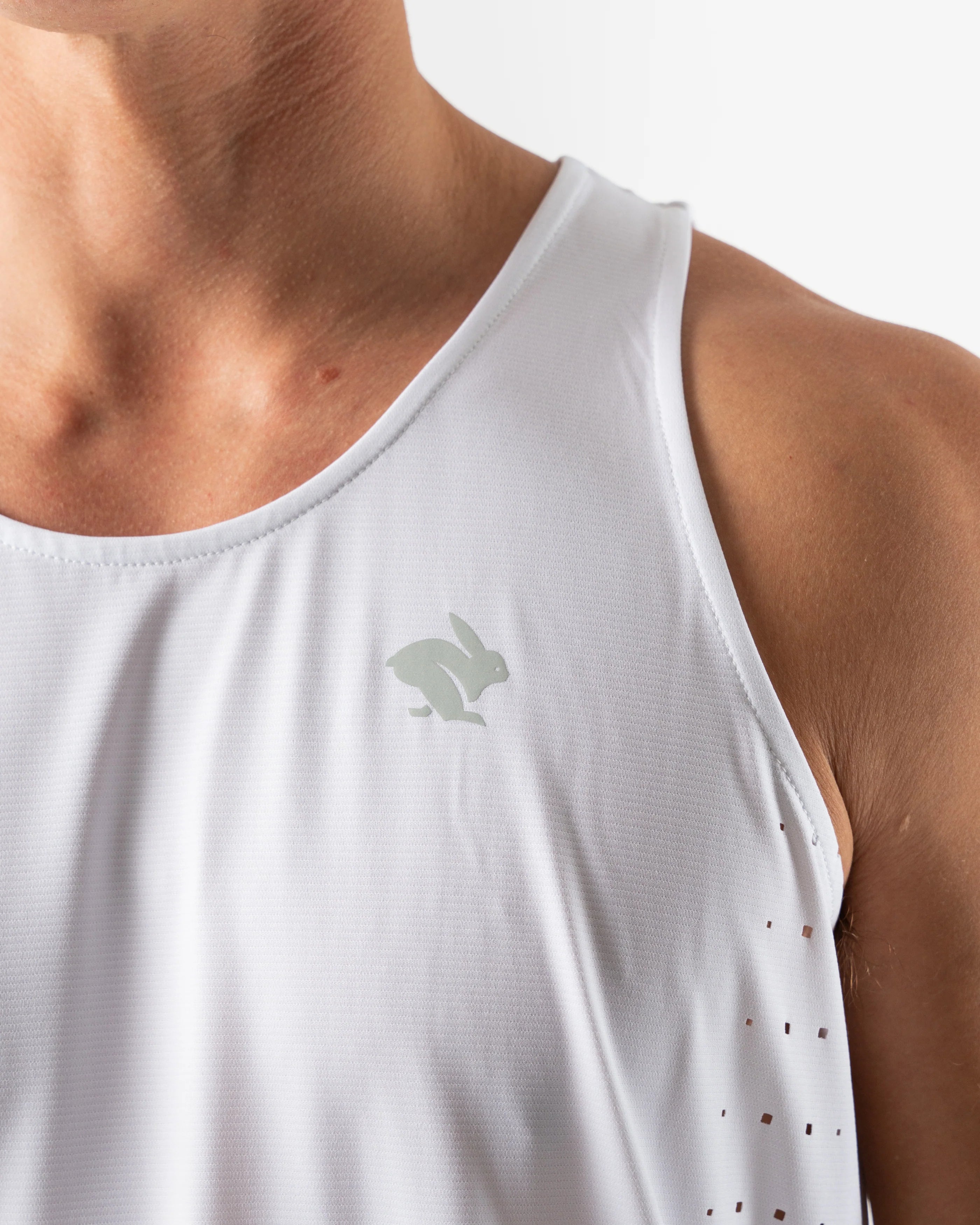 Race Pace Tank - Men by Rabbit in white breathable tank with laser-cut square perfs and microtextured inside ideal for running