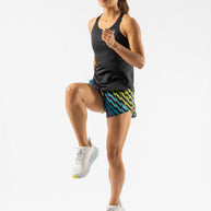 Runner wearing black tank and Rabbit Sunset Splitz 2.5