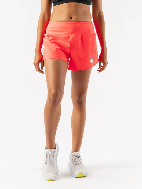 Summit Chasers 4 - Women by Rabbit in coral with five pockets and durable stretch diamond ripstop, ideal for running and outdoor use