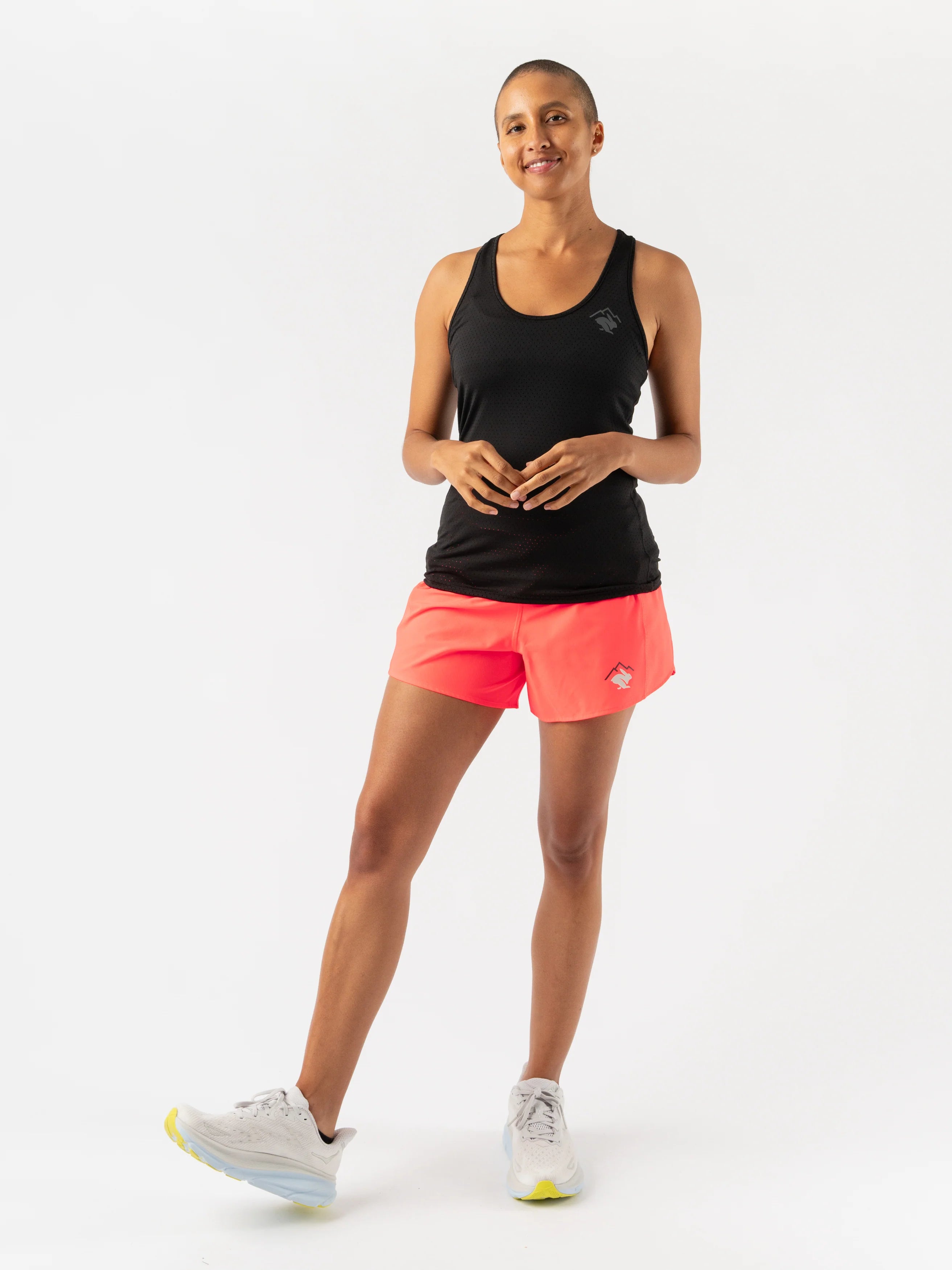 EZ Tank Perf Trail - Women by Rabbit in black lightweight tank with perforations for breathability, ideal for trail running and workouts