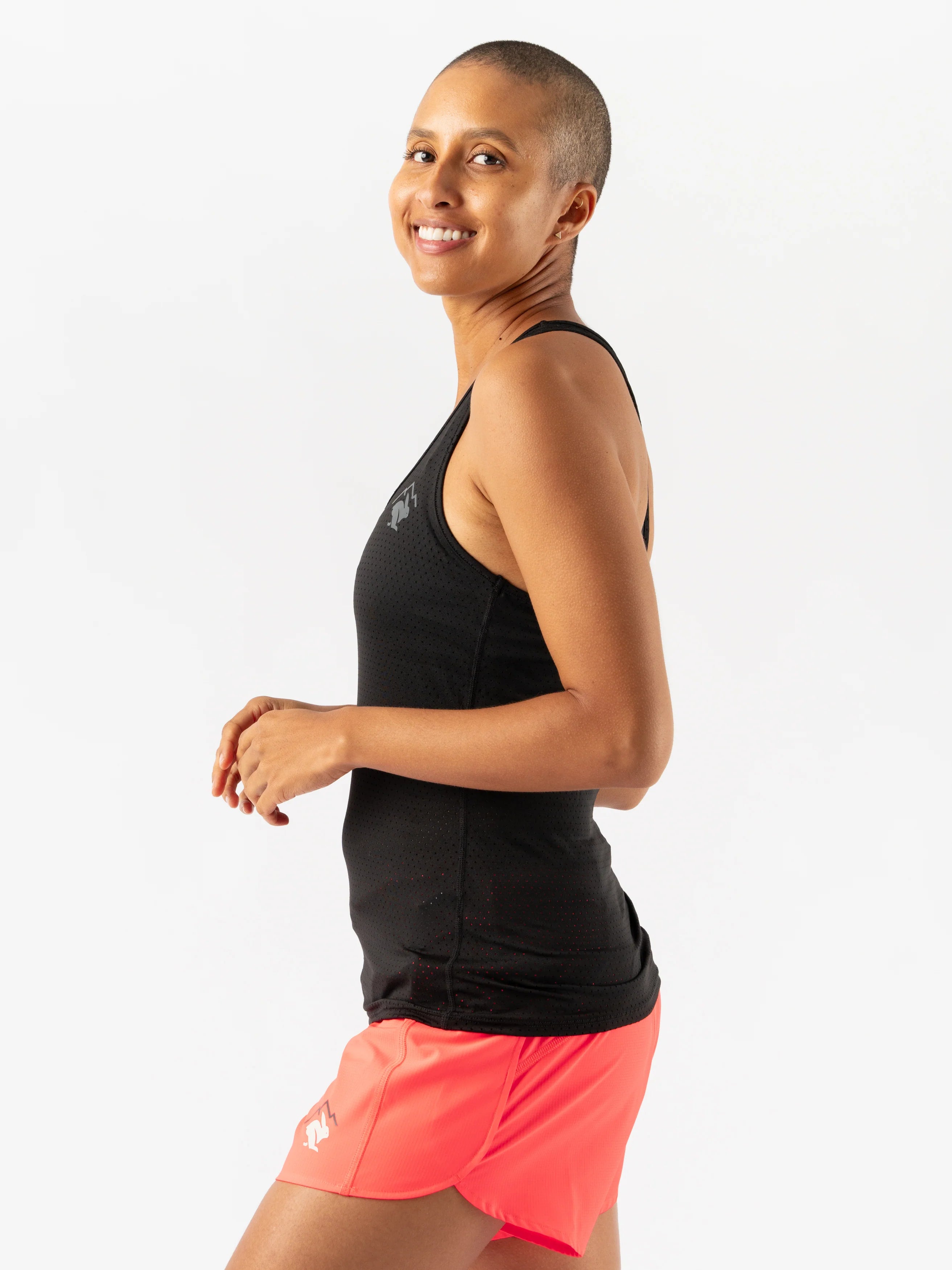 EZ Tank Perf Trail - Women by Rabbit in black, lightweight perforated tank top designed for breathable everyday trail running and workouts