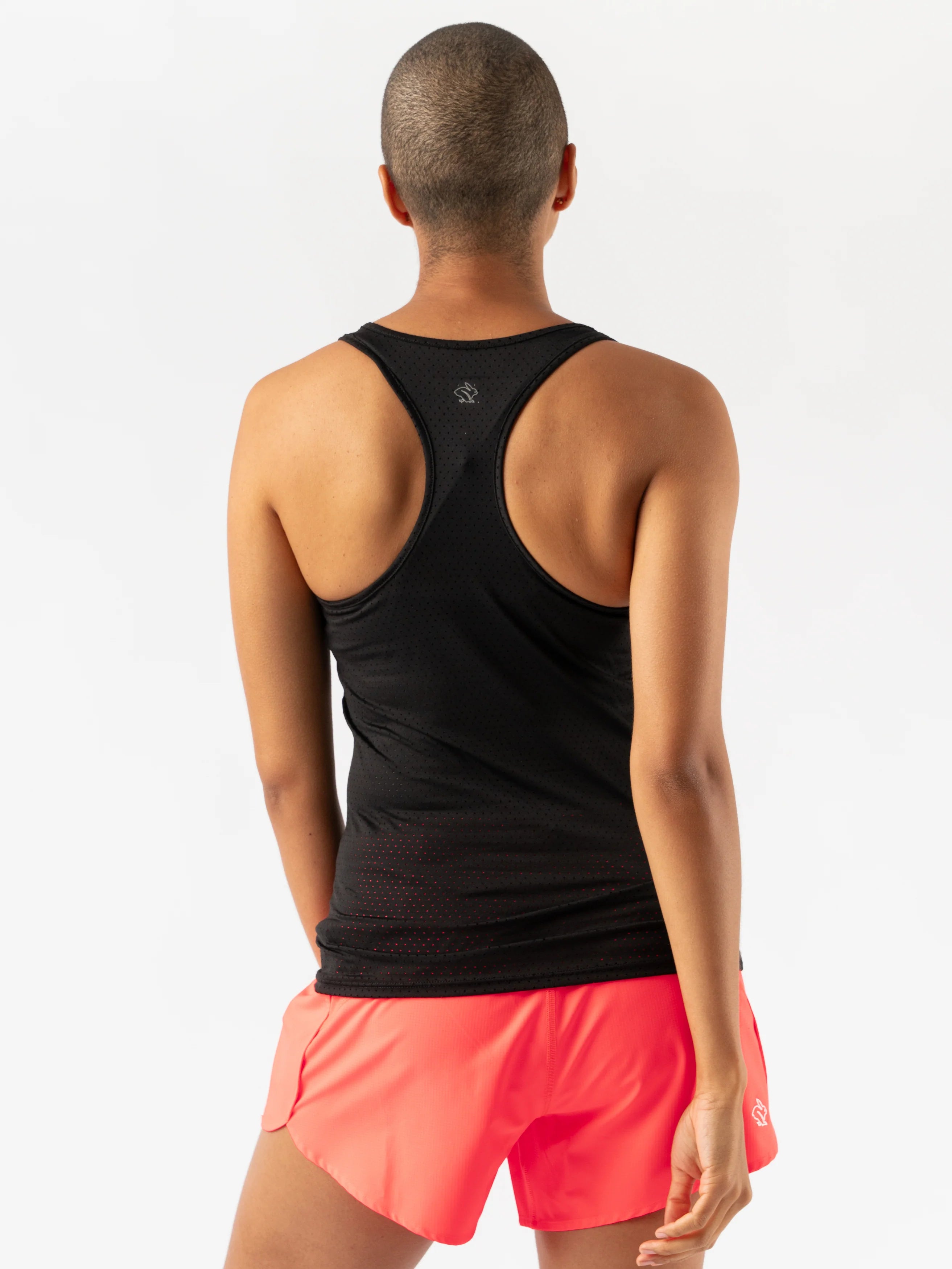EZ Tank Perf Trail - Women by Rabbit in black with perforations, breathable lightweight tank for everyday running and quick workouts