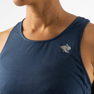 Race Pace Tank - Women by Rabbit in navy blue with breathable laser-cut perforations and microtextured inside for running and training comfort