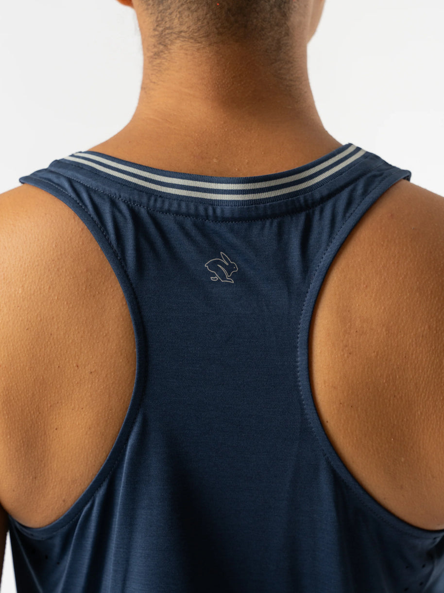Race Pace Tank - Women by Rabbit in navy blue semi-relaxed tank with breathable laser-cut perfs ideal for running and training