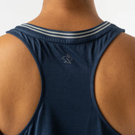 Race Pace Tank - Women by Rabbit in navy blue semi-relaxed tank with breathable laser-cut perfs ideal for running and training