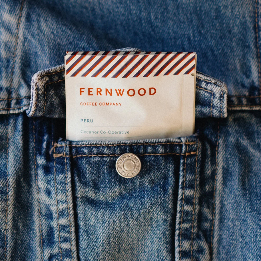 Instant Decaf Coffee by Fernwood in cream packaging with red and blue stripes, small batch brewed crystallized coffee solids from Canada