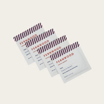 Instant Decaf Coffee by Fernwood in white sachets with red and blue stripes, small-batch brewed crystallized coffee solids from Canada-made brand
