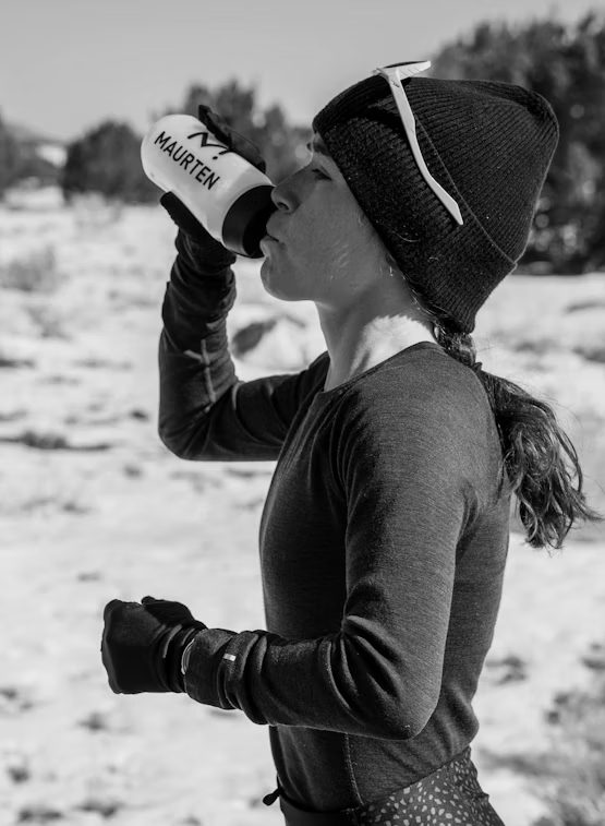 Drink Mix 320 Caf 100 by Maurten in white bottle, caffeine and hydration mix for endurance running in cold weather Canada