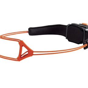 Side view of the Petzl Swift RL Headlamp with black rear pad and orange cord frame