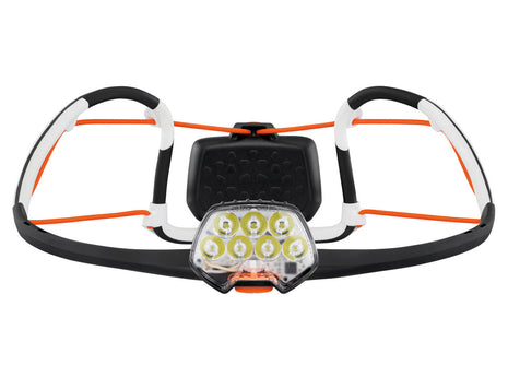 IKO Core Lamp by Petzl in black and orange, rechargeable headlamp with 500 lumens and lightweight AIRFIT headband for safety and outdoor use
