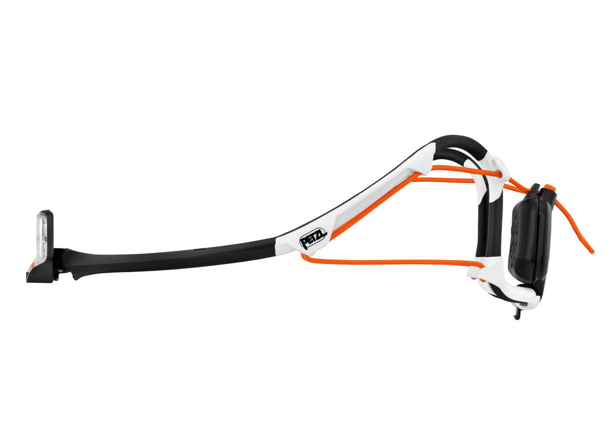 IKO Core Lamp by Petzl in white and black with orange accents, rechargeable 500-lumen headlamp with AIRFIT headband for safety and outdoor use