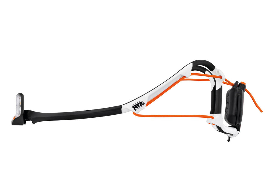 IKO Core Lamp by Petzl in white and black with orange accents, rechargeable 500-lumen headlamp with AIRFIT headband for safety and outdoor use