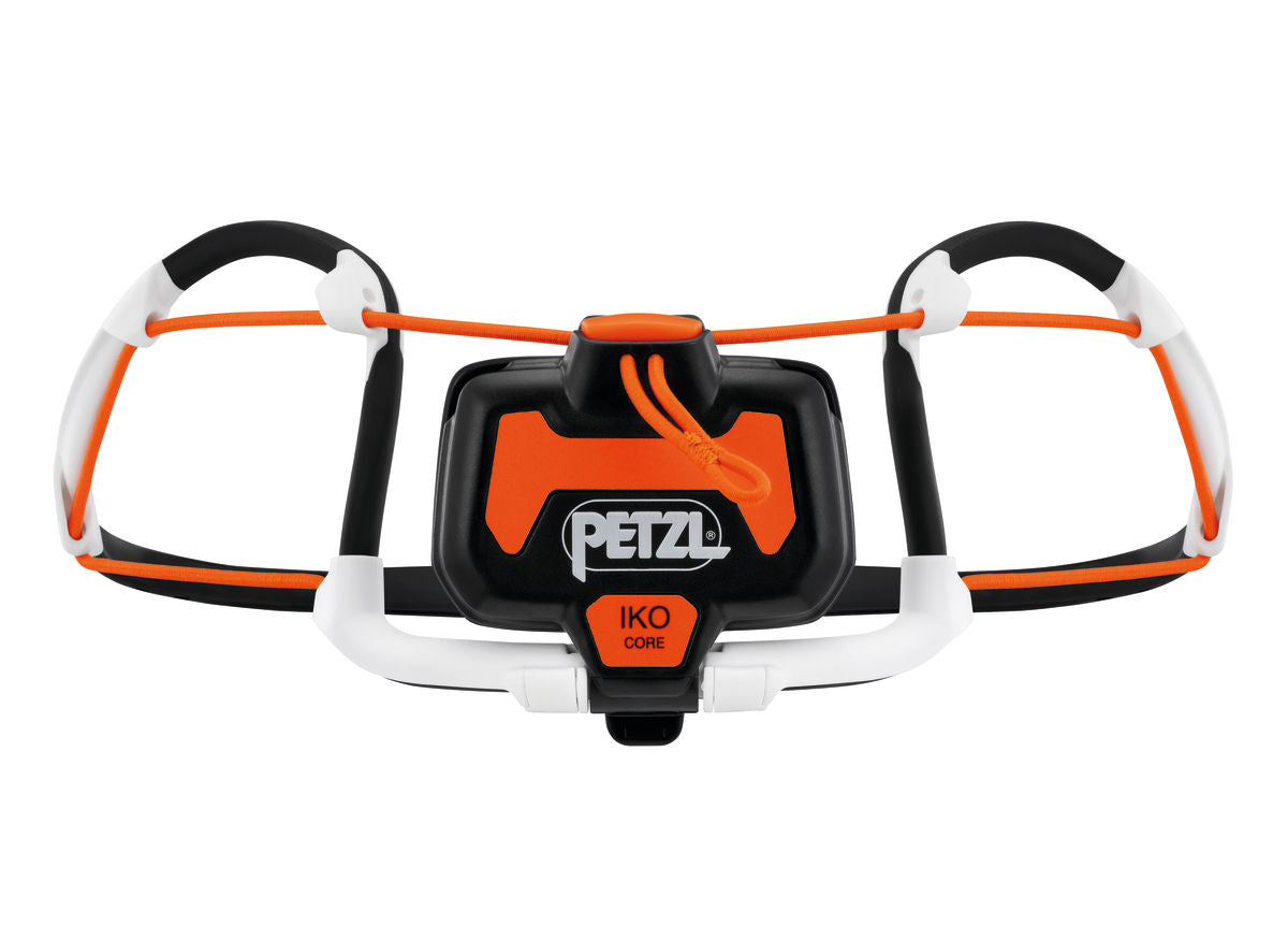 IKO Core Lamp by Petzl in black and orange, rechargeable headlamp with 500 lumens and AIRFIT headband for lightweight safety use