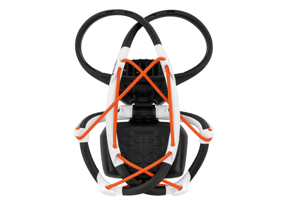 IKO Core Lamp by Petzl in black and white with orange accents, rechargeable headlamp delivering 500 lumens with AIRFIT headband for lightweight safety use
