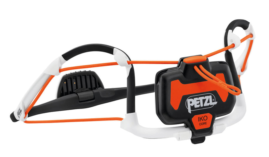 IKO Core Lamp by Petzl in black and orange, rechargeable headlamp with 500 lumens and lightweight AIRFIT headband for safety and outdoor use