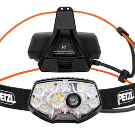 Nao RL Headlamp by Petzl in black with orange accents, 1500 lumens rechargeable trail running headlamp, lightweight and adjustable.