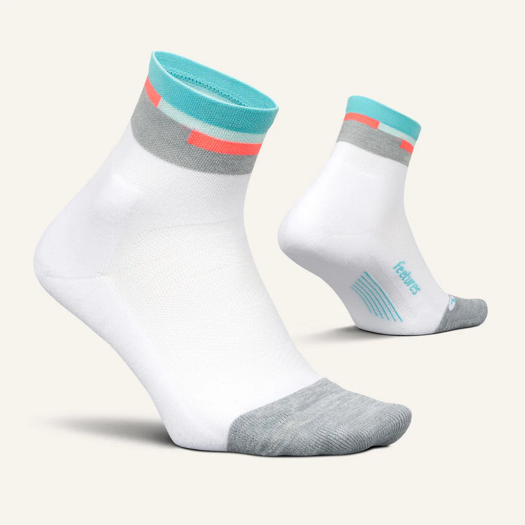 Elite Light Cushion Quarter by Feetures in white, grey, and teal with anatomical design and targeted compression for running and extended wear